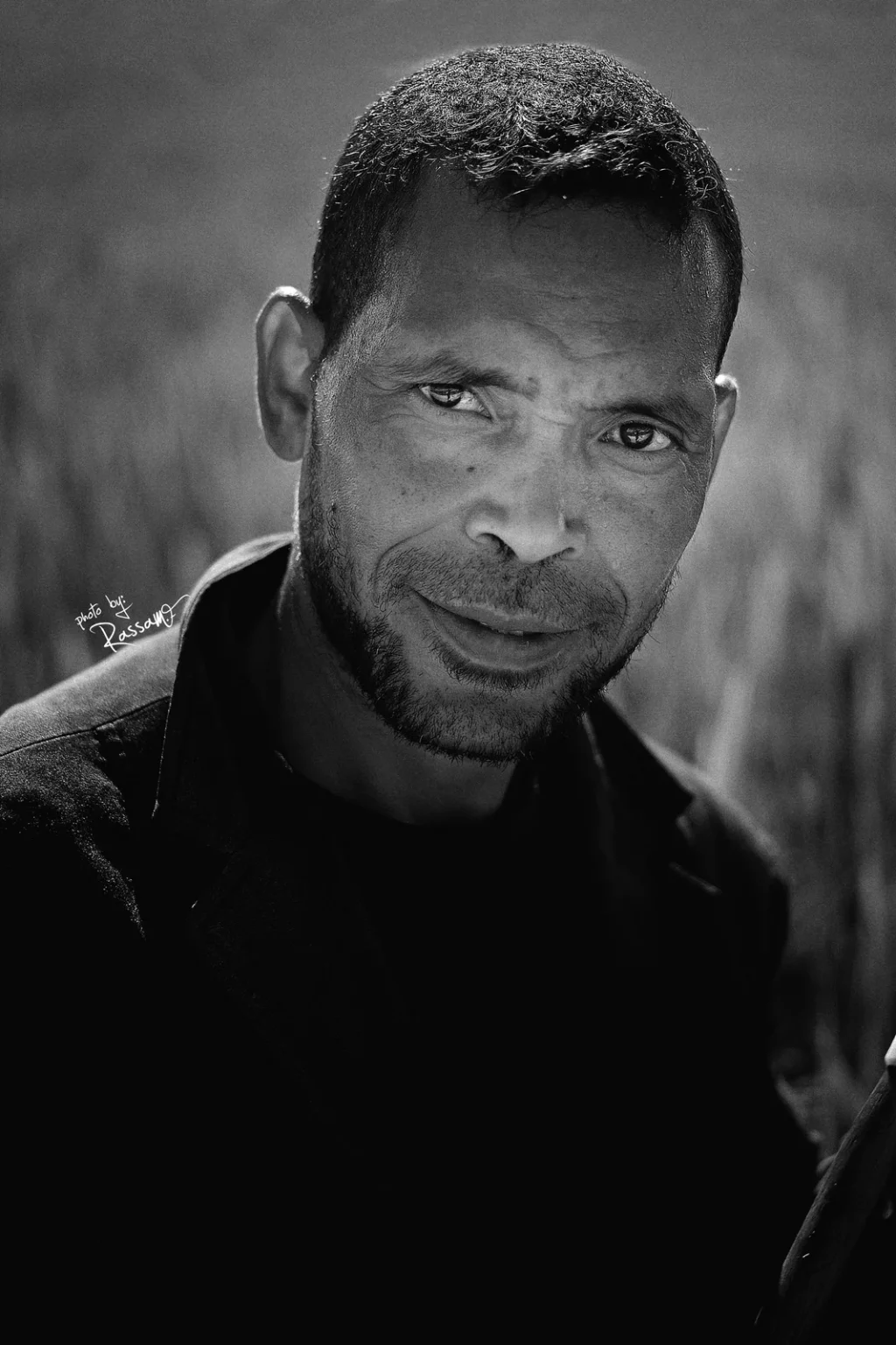 Backlit portrait of a farmer