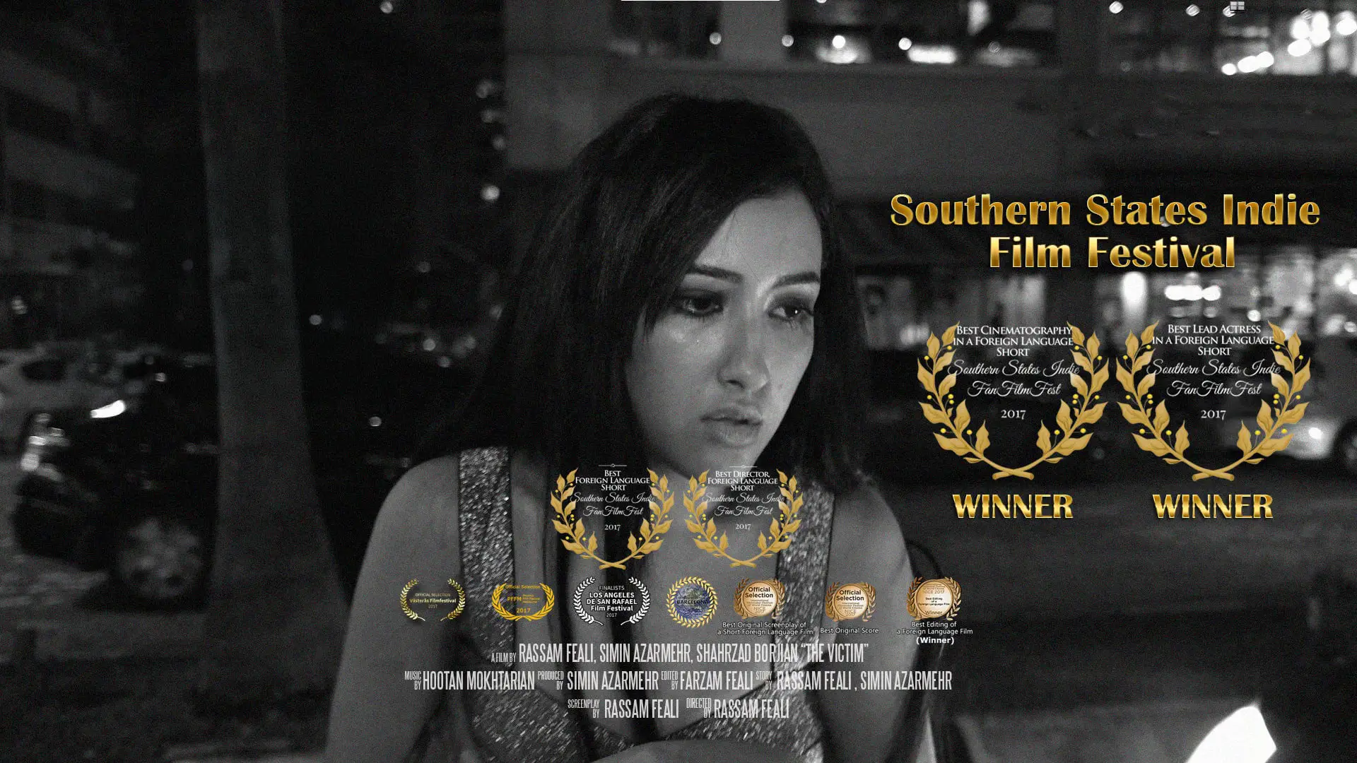 A still from The Victim: the lead actress at night, with the festival laurels